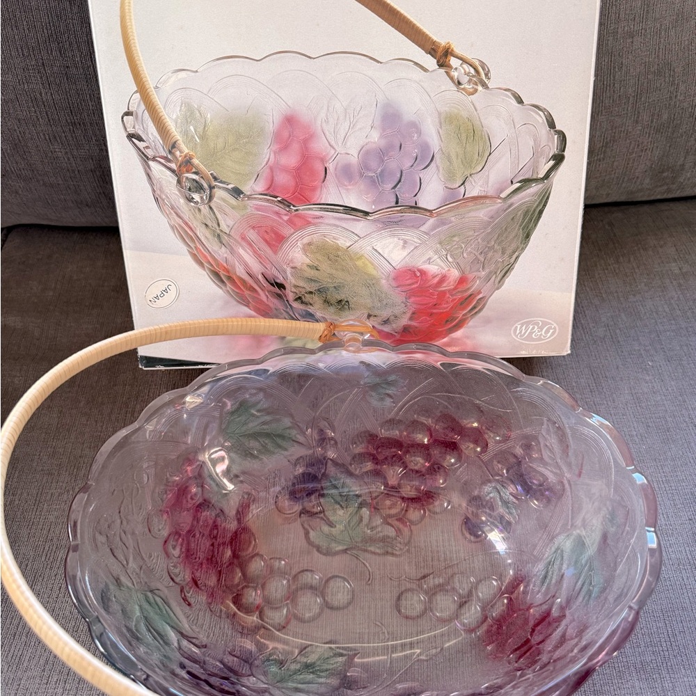 WP&G crystal colored‎ fruit bowl with rattan handle.